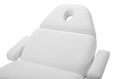Close-up of Adore Electric Beauty Bed showing white PU leather upholstery, headrest with breathing hole, and arm support