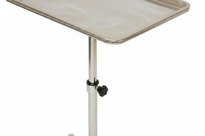 Close-up of chrome salon tray trolley showing steel tray surface, five-wheel swivel base, and height adjustment mechanism