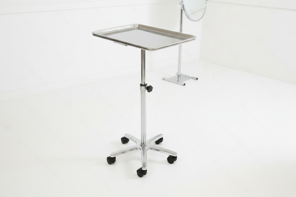 Adjustable rolling steel salon tray trolley, chrome finish, side angle view in a modern salon